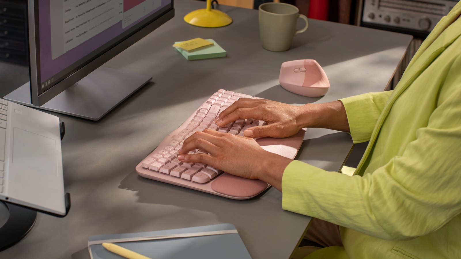 Logitech Wave Keys Rose in use on a desk